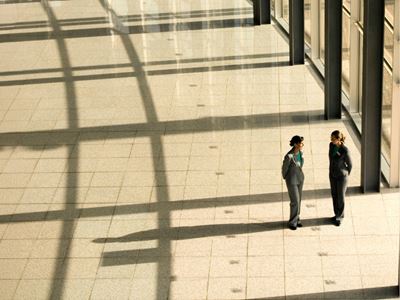 Business professionals hold a discussion in a office