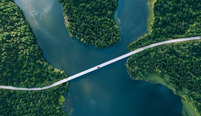 Aerial view of a road bridge spanning a river
