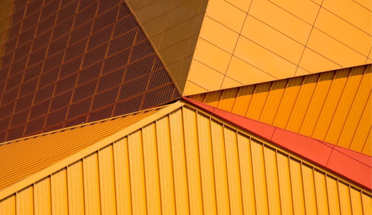 Geometric roof panels with colorful reflections
