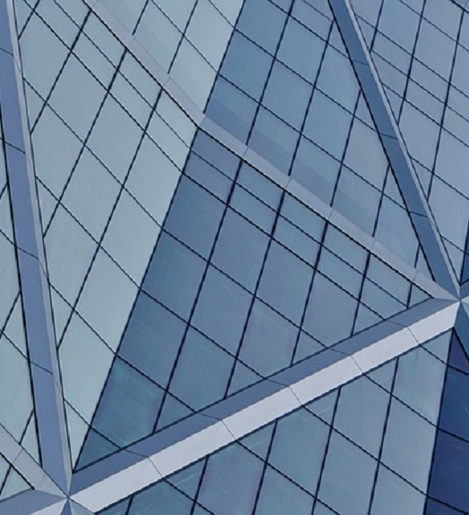 Rows and columns of windows along a curved building