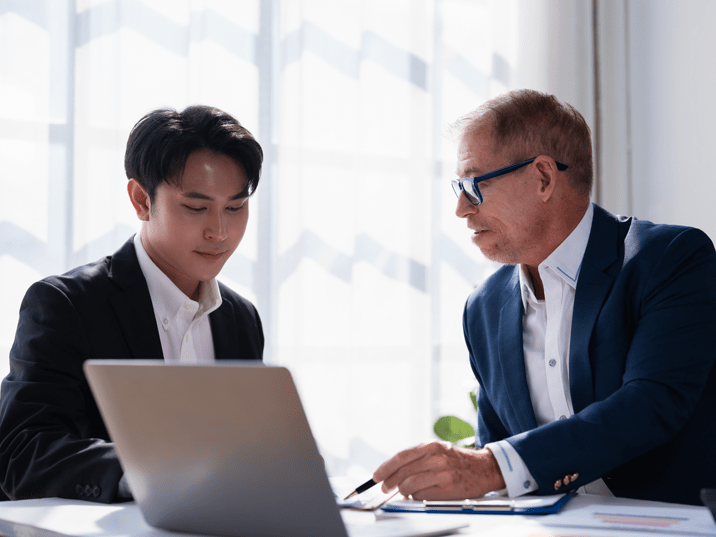 Two professionals discussing work