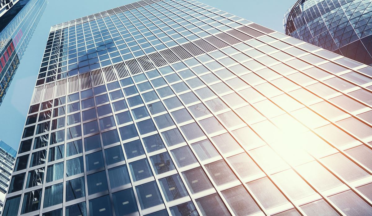 Sun reflecting off a glass skyscraper