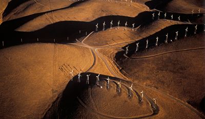 Aerial view of windmills in desert