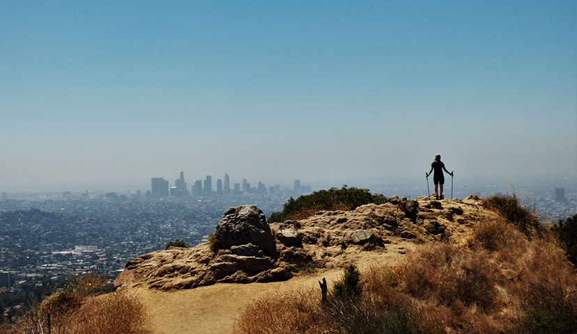 Hiker gets to see downtown view from a hill