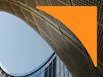 Close-up of a curved architectural structure with warm amber tones and parallel ridges, with an orange geometric shape in the upper right corner.