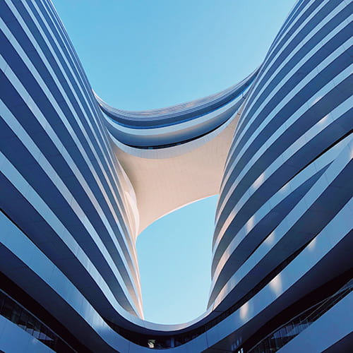 Exterior of a modern, wavy building