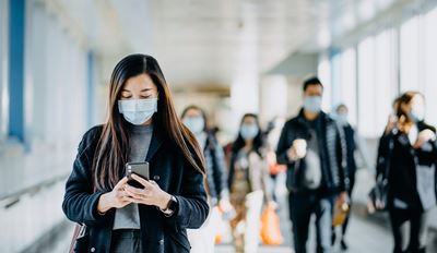 Traveler in airport with face mask