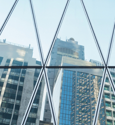 view of buildings through geometric window panes