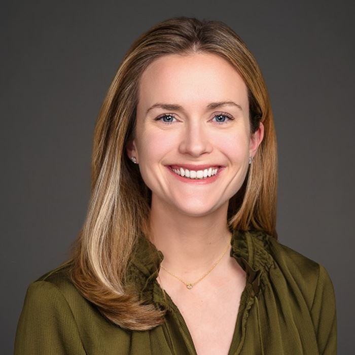 Person smiling for a portrait