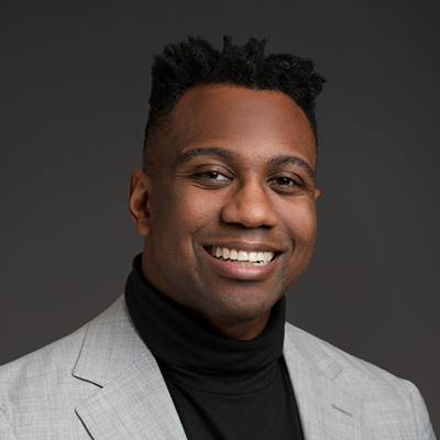 Person smiling for a portrait