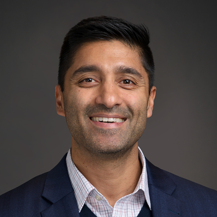 Person smiling for a portrait