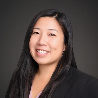 Person smiling for a portrait