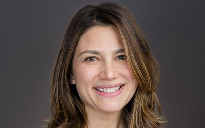 A head shot image of a CEO and CIO of Nuveen Green Capital