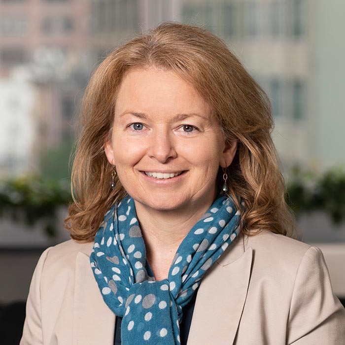 A woman smiling at camera