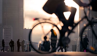 Sunset view through bicycle wheel